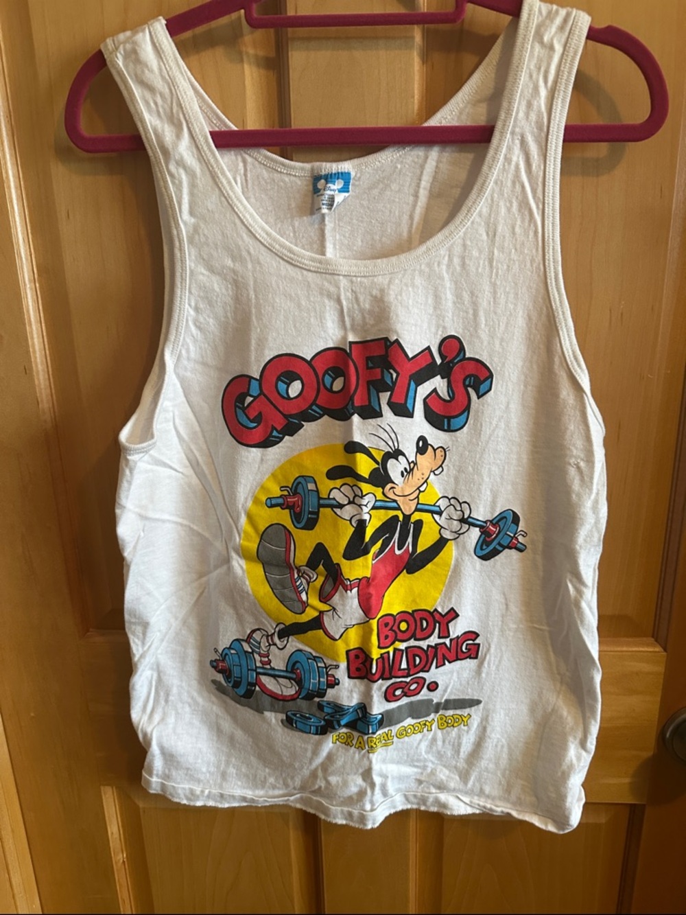 Disney White Tank Top with Multicolor Goofy Weightlifting Graphic